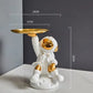 Creative sculpture of an astronaut with a tray - white 1 -