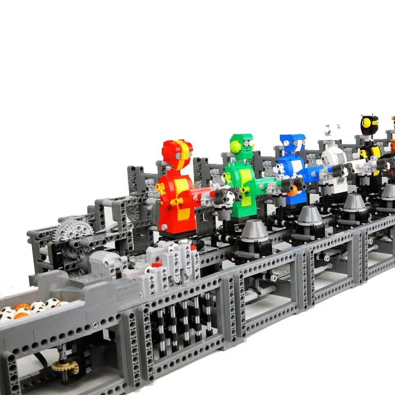 Designer-robots on the conveyor - toys